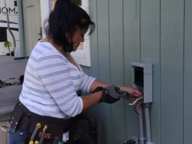 Licensed electrician wiring an exterior subpanel in Susquehanna